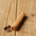 brown cinnamon roll on brown wooden surface